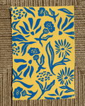 Yellow floral linocut postcard prints on a brown textured background. Blue white and yellow 4 by 6 inches