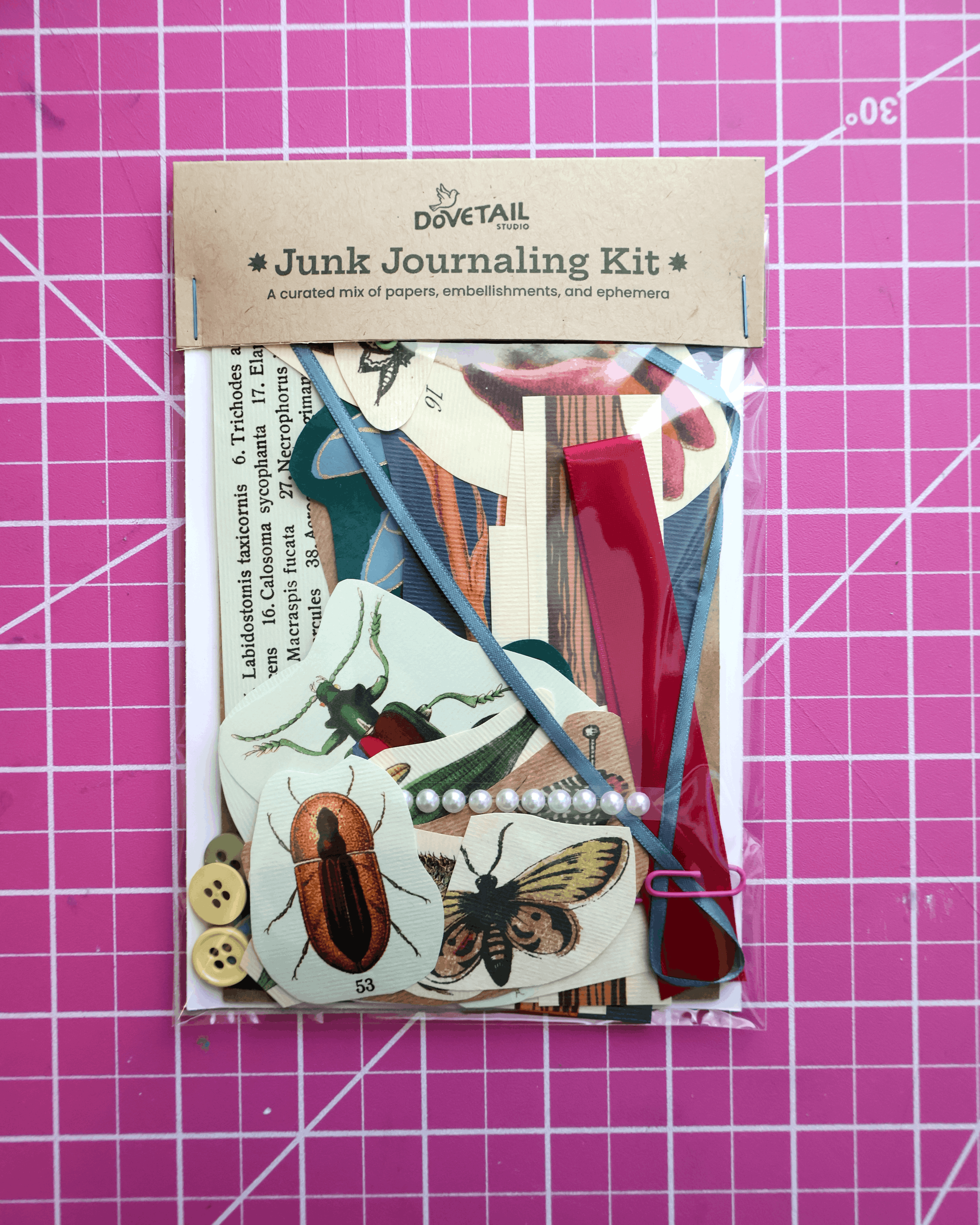 garden Junk Journaling Kit on a pink grid background