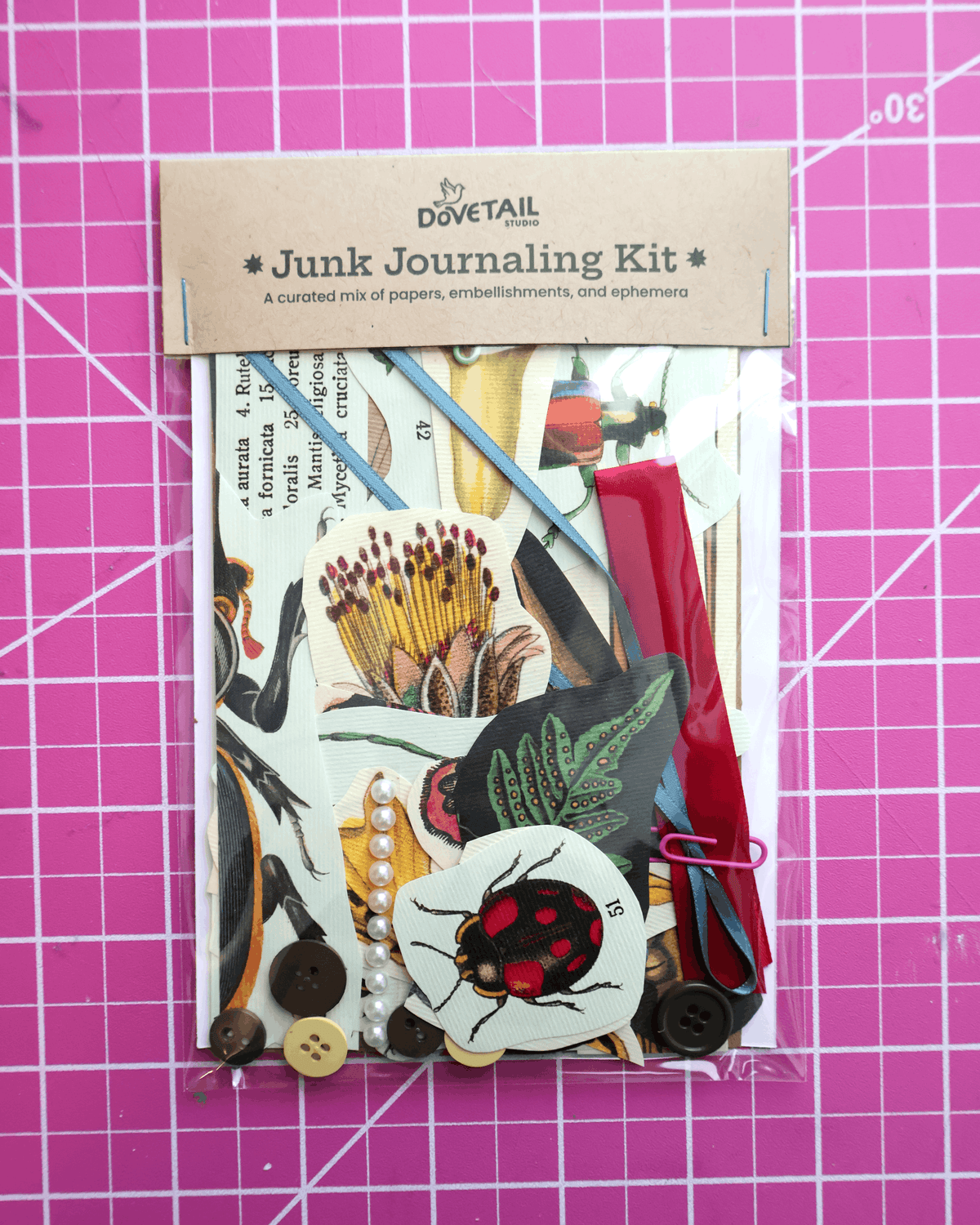 garden Junk Journaling Kit on a pink grid background
