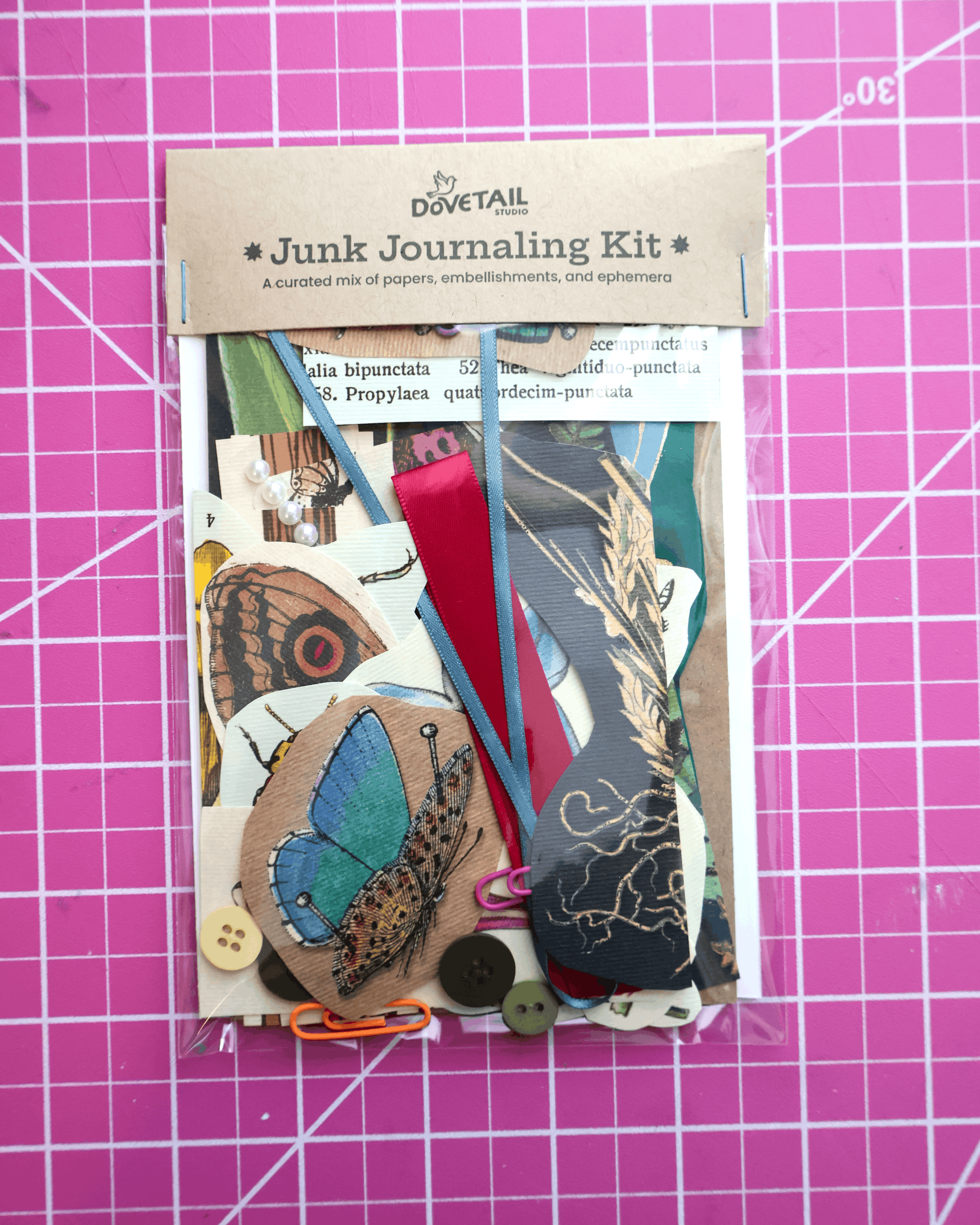 garden Junk Journaling Kit on a pink grid background