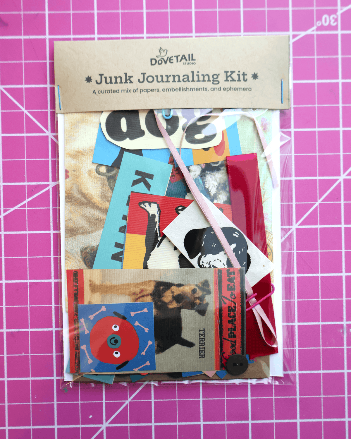 Dovetail Junk Journaling Kit with various embellishments and papers. dog and pet theme 